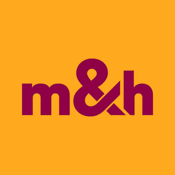 Burgundy m&h logo on an orange background.